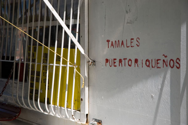 Hand-painted letters on a white truck announce the
offerings.