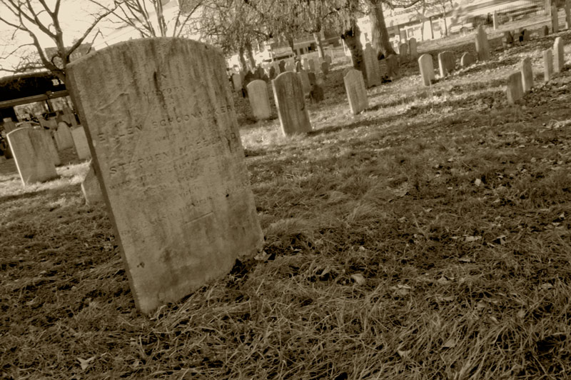 An old tombstone in a churchyard.