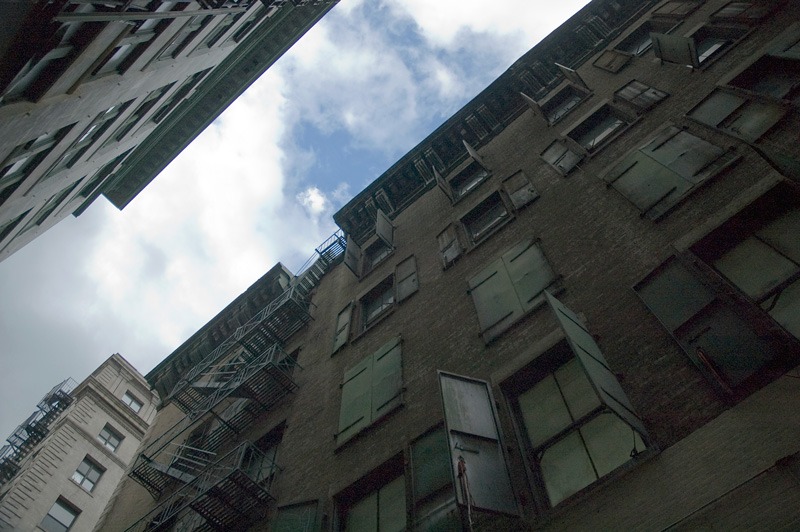 Sky and clouds, between two buildings.